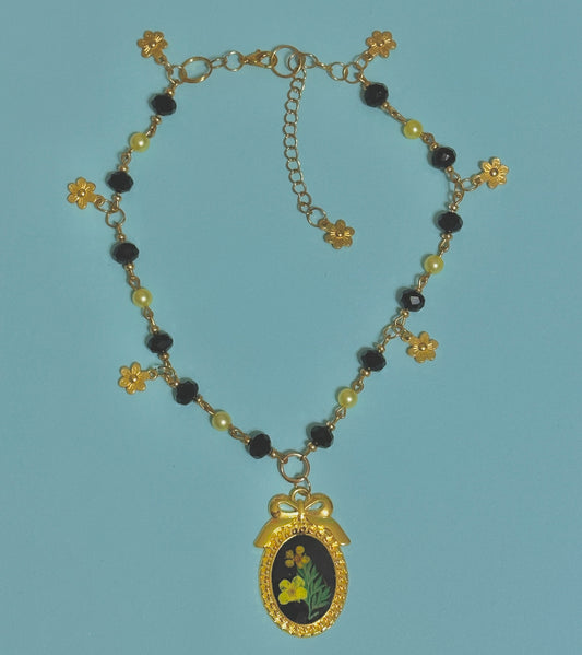 The sunflower noir necklace