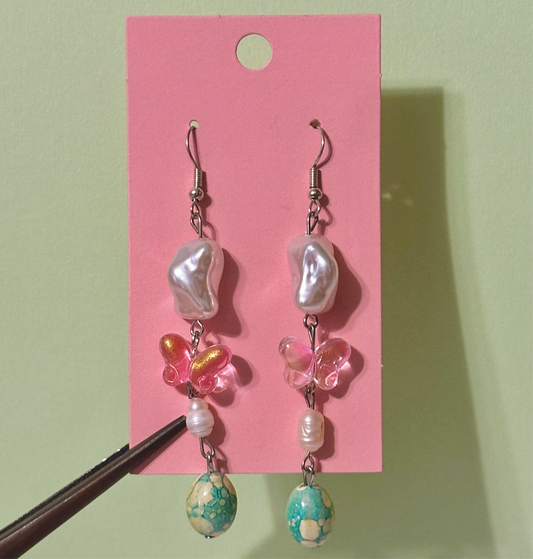 The butterflies egg earrings